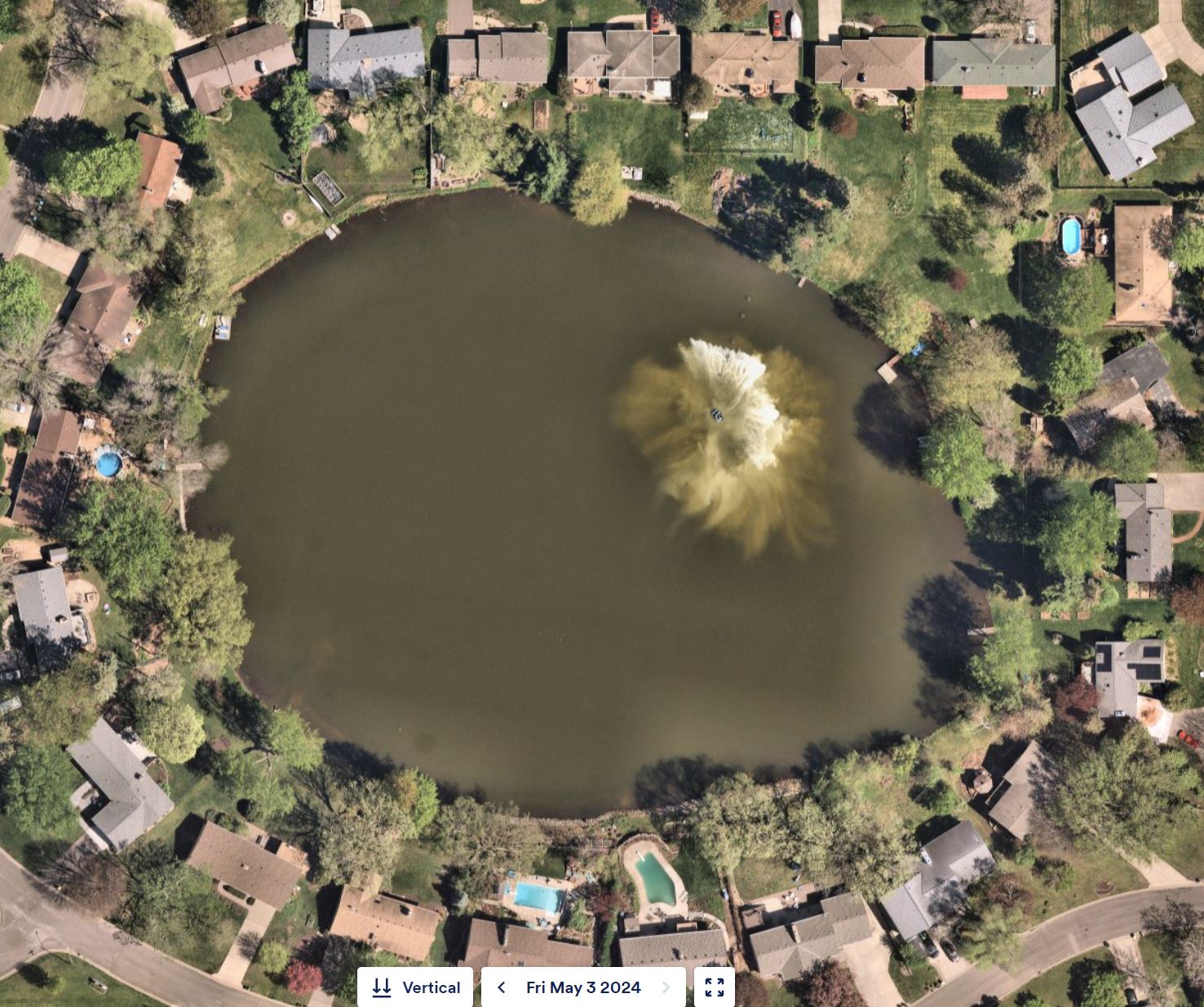 Image slide of An aerial view of spent lime application. 